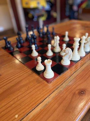 Inlaid Chess/Checker board on one of the tables they also have an inlaid Chinese Checkers set!  FUN!