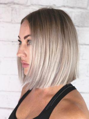 Cool blonde bob with a root melt