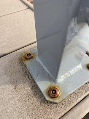 Rusting screws on the railing