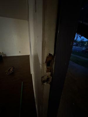 Front door frame broken from people trying to force it...