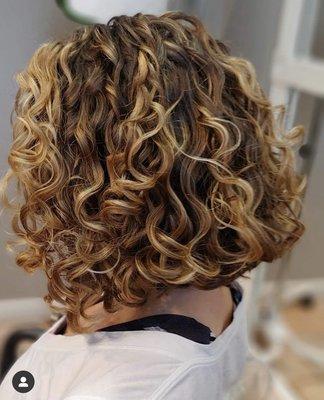 Devacurl cut and styled with volumizing foam & styling cream.