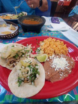 Got 2 chicken tacos flour tortillas refried beans and rice! The tortilla chips were the only thing that didn't impress me!