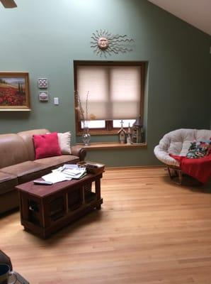 The cozy furniture grouping welcomes potential buyers to sit and relax in this lovely home.