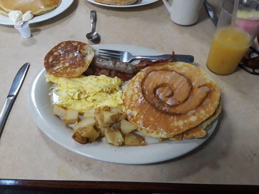 Hungry man with Cinnamon Roll Pancakes..