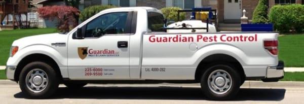 Guardian Pest Control Truck in front of customers home