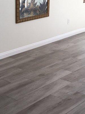 Wood look tiles are beautiful, durable, and an easy flooring to maintain.