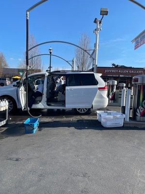 Peep the art in the back. What a beautiful day for a car wash!