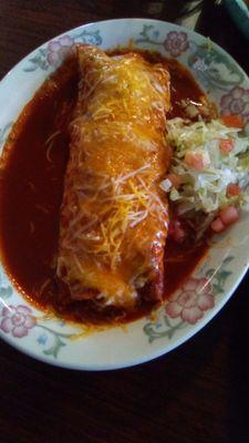 Pepe's red chile con carne smothered burrito. Lots of meat but lacking seasoning and flavor. Chile sauce was so-so. Rate it a   "C"