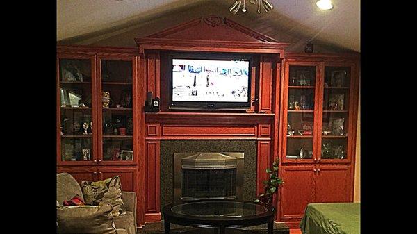 Custom TV cabinet with book shelve and fire place mantle