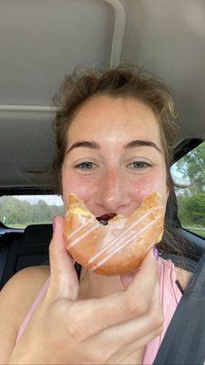 Happy face with the glazed jelly donut