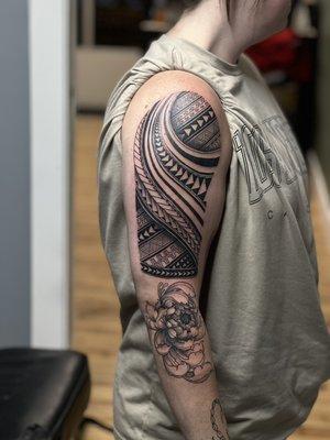 Custom chrysanthemum and Polynesian tattoo