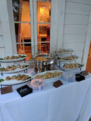 Appetizer spread for a pool-side rehearsal dinner