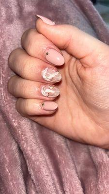 Almond shape on a set of short nails that doesn't look bulky or ugly! Also they have the correct type of gold to use for marble nails