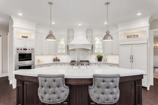 Pure White Quartz matched with beautiful chevron tiles!