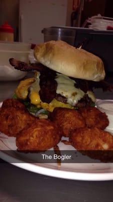 double bacon cheeseburger with two cheeses, all the toppings, and a side order of Troy's Tots