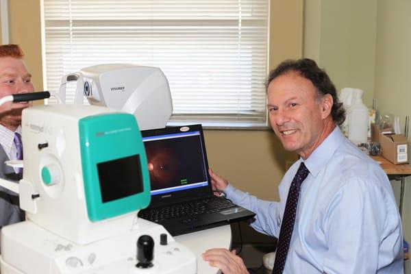 Dr. Page working with a patient.