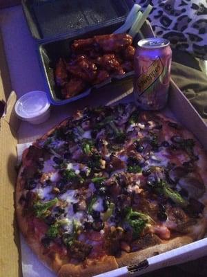 Small veggie pizza & BBQ wings ! Absolutely so delicious (excuse the bad lighting) Their veggie pizza is hands down the best!