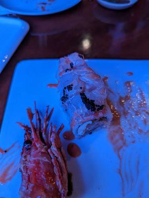 Part of the dragon has shrimp on top that was fully raw and the server said this is normal.