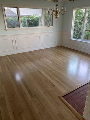 Refinished floor in dining room.