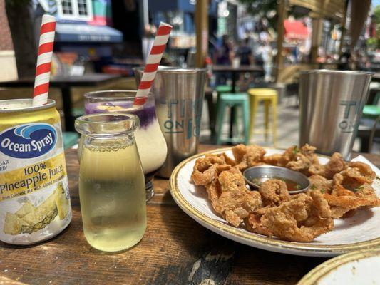 Pinacolada flight (Normal Pinacolada, Filtered Pinacolada, Ube Pinacolada) and Chicken skin