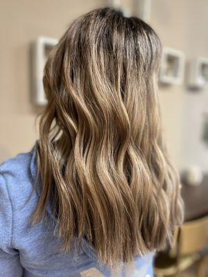 Ashy honey blonde with a root shadow