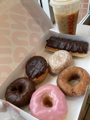 Half dozen donuts and cake batter coffee