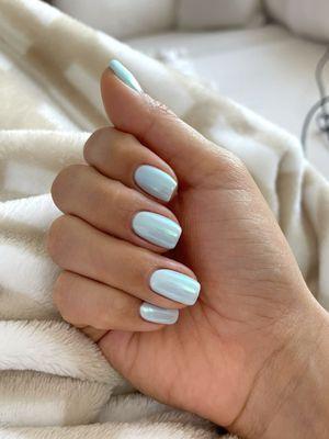 a light blue polish from DND gel with chrome on top