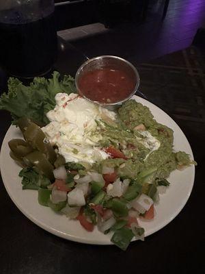 The sour cream, "guacamole" and some other stuff that was supposed to go over the quesadillas.