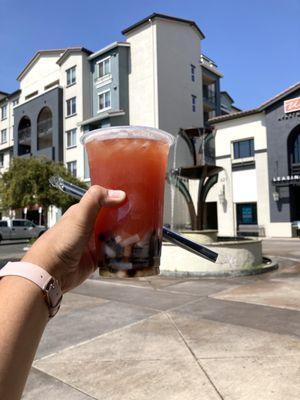 Boba and a view. Cheers to the boba gods! This was delicious! Strawberry Mango Green Tea with Lychee jelly and boba