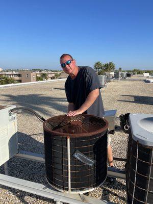 Dave removing neighbors unit. My deal was so great, they bought a new AMANA also. A double deal!