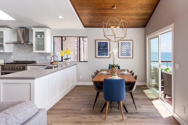 oceanfront home in Encinitas featuring SLCC vinyl in the Arcadian Collection, color: Eden. counters are by MSI in Fossil Gray & Blanco Zeus.