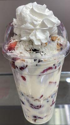 Fresas con crema Que Rico! Strawberries topped with crema dulce, granola coconut and raisins.