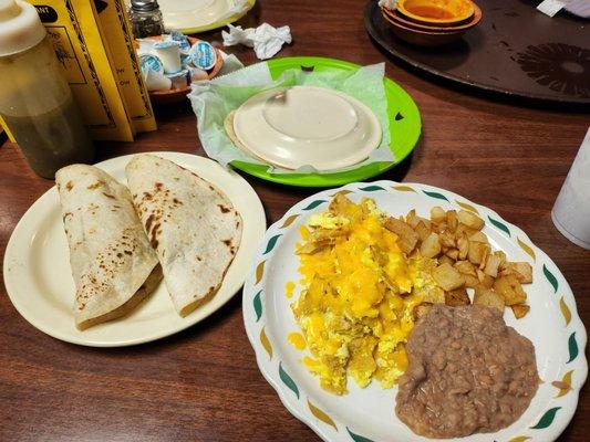 Migas with barbacoa and bean/cheese tacos