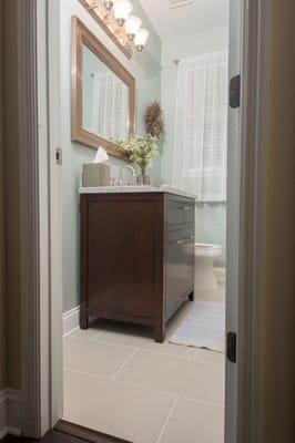 Wide dark stained oak wood floors.