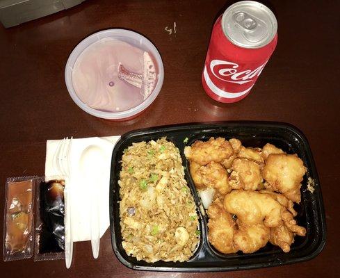 Sweet &a Sour Chicken with Chicken Fried Rice combination & a coke can. About $10