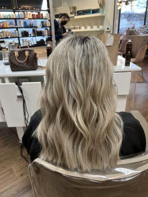 Ashy blonde with a root shadow