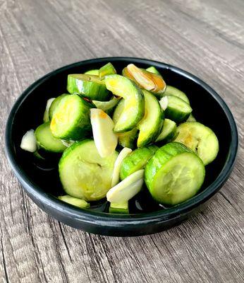 Pickled cucumber with slivered garlic, sesame oil and light chili oil fragrance.