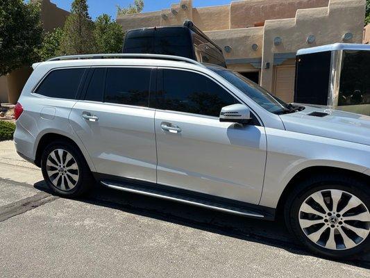 Front windows are now tinted to match side rear windows. Temps inside the car are much cooler, and improved privacy + security