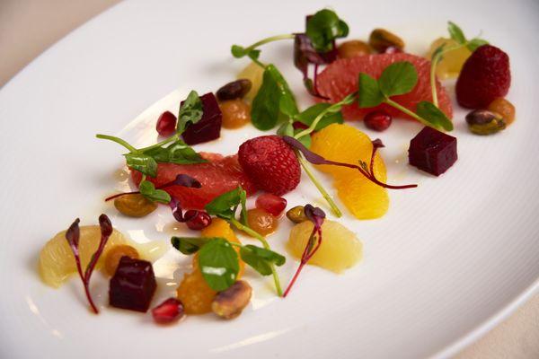 Fruits & Shoots Salad: citrus supremes, roasted baby beets, wild berries, micro basil, local honey, pistachio, pea and corn shoots