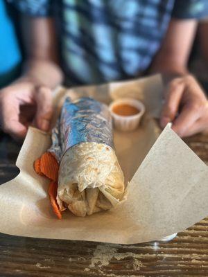 Burrito with chicken. It's an okay size