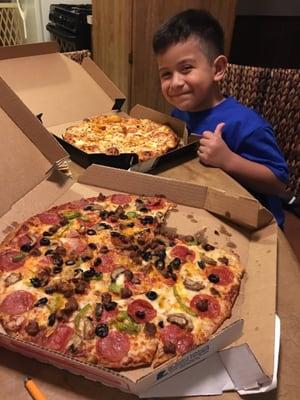 Me and my little buddy enjoying some pizza and with some cold drinks. Loving it