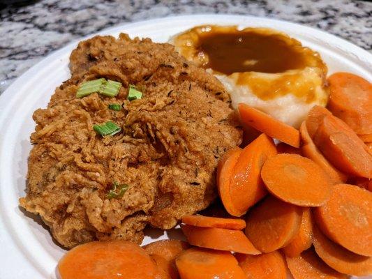 Close-up of the fried pork chop. Really good. Bone-in. I believe it's the same batter and seasoning as the fried chicken.