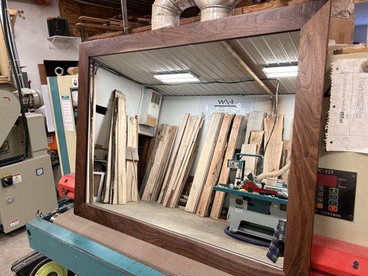 Beautiful custom walnut mirror that matches a custom walnut vanity we built for a customer