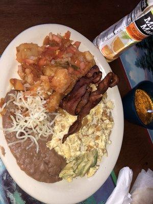 Migas papa ranchera and bacon , beans ,delicious