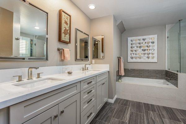 This master bathroom was built in the 1980s and had all original finishes, the space is now customized for the owners