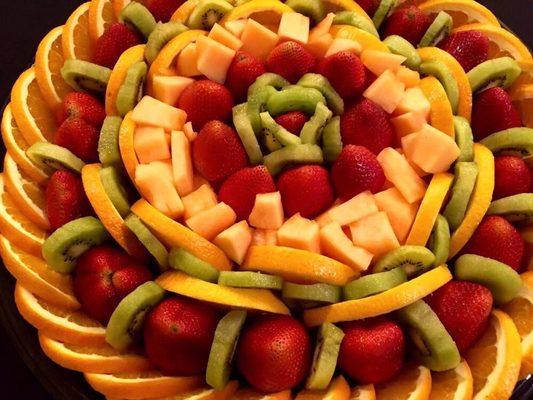 Orange,strawberry,kiwi and cantaloupe fruit tray