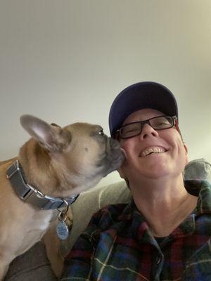 Got to love puppy kisses. Julie and Lilas.