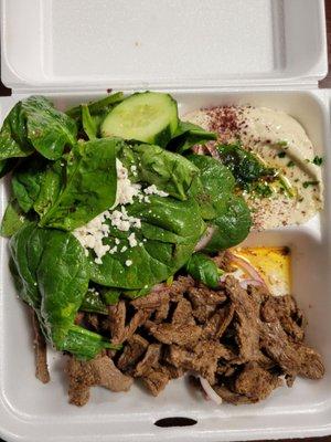 Beef shawarma with hummus and Greek salad