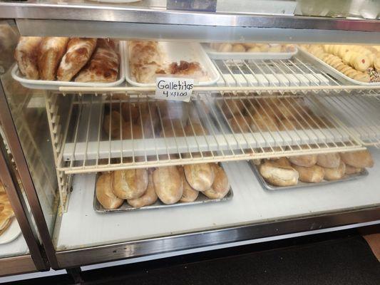 Far left there's a pastry called "Libro" flaky, sugar honeyed crust it's delicious but delicate with some tea or coffee. Try the bollio