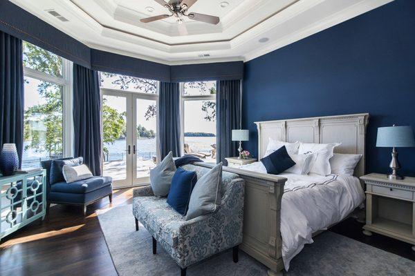 Do you love the design of this bedroom? We think the best part is that lake view!